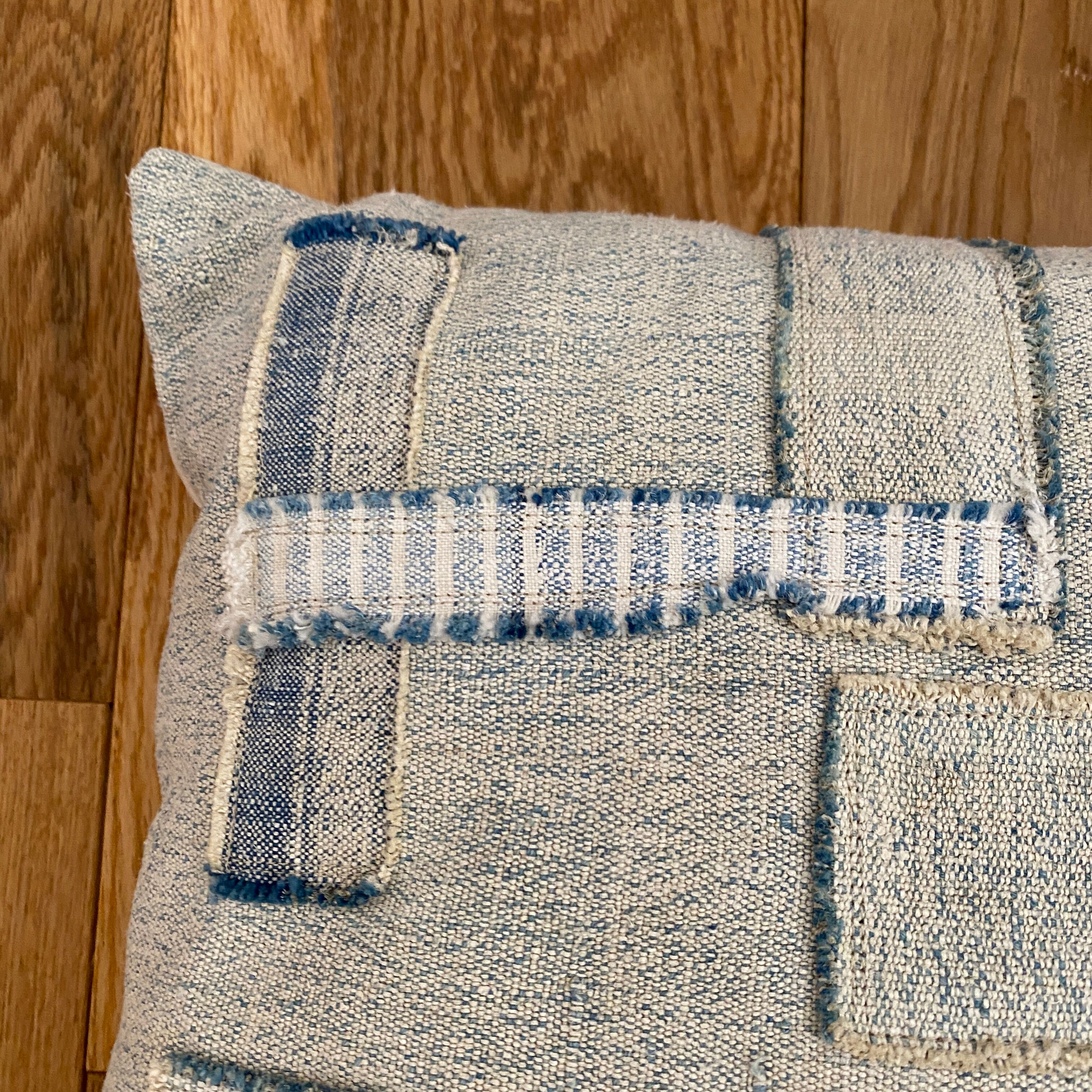 Old canvas cushion woven kilim style, patched