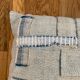 Old canvas cushion woven kilim style, patched