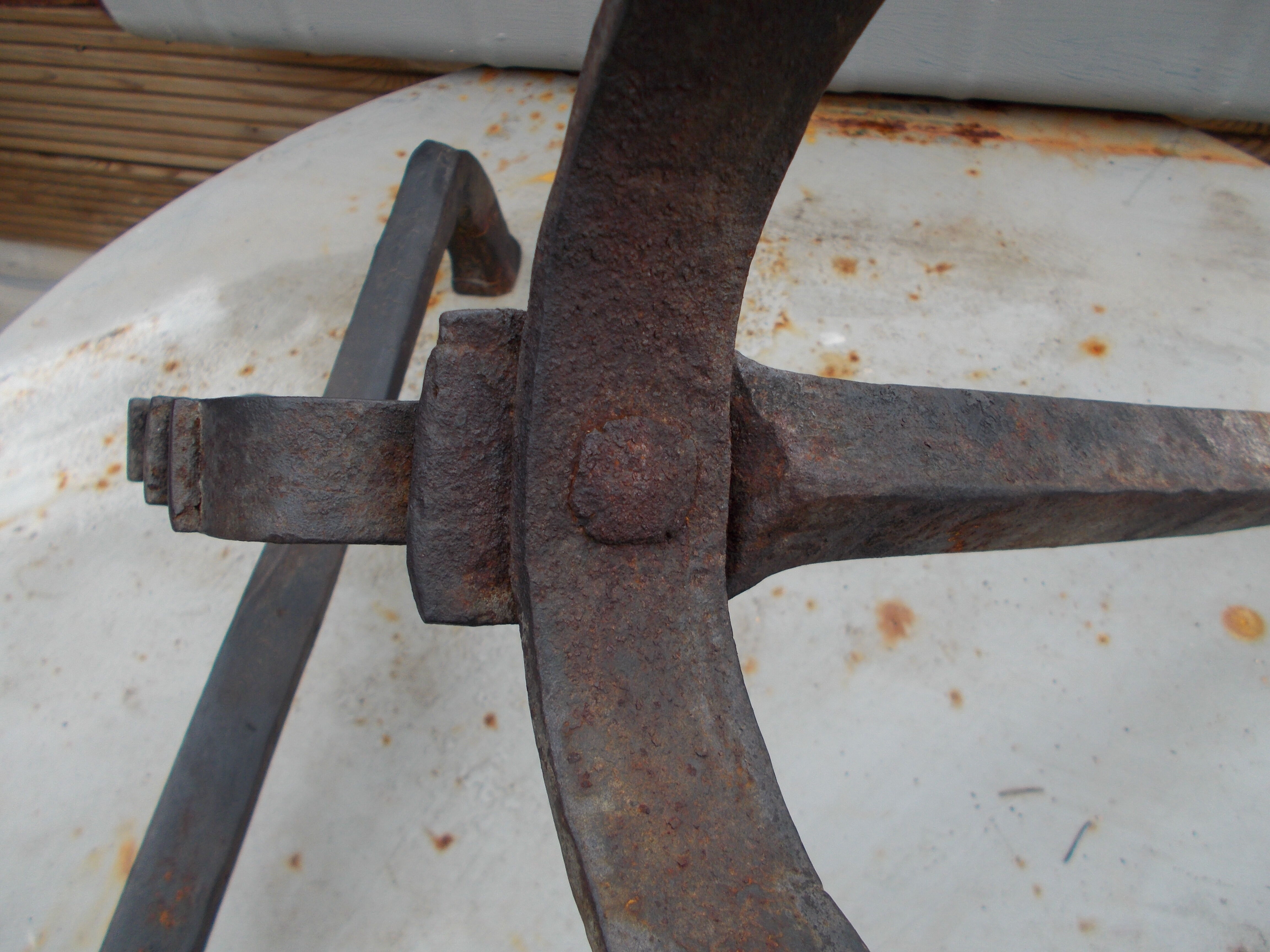 Old pair of wrought iron pegs