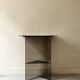 Vintage console in smoked glass and textured organic brown, 70s design.