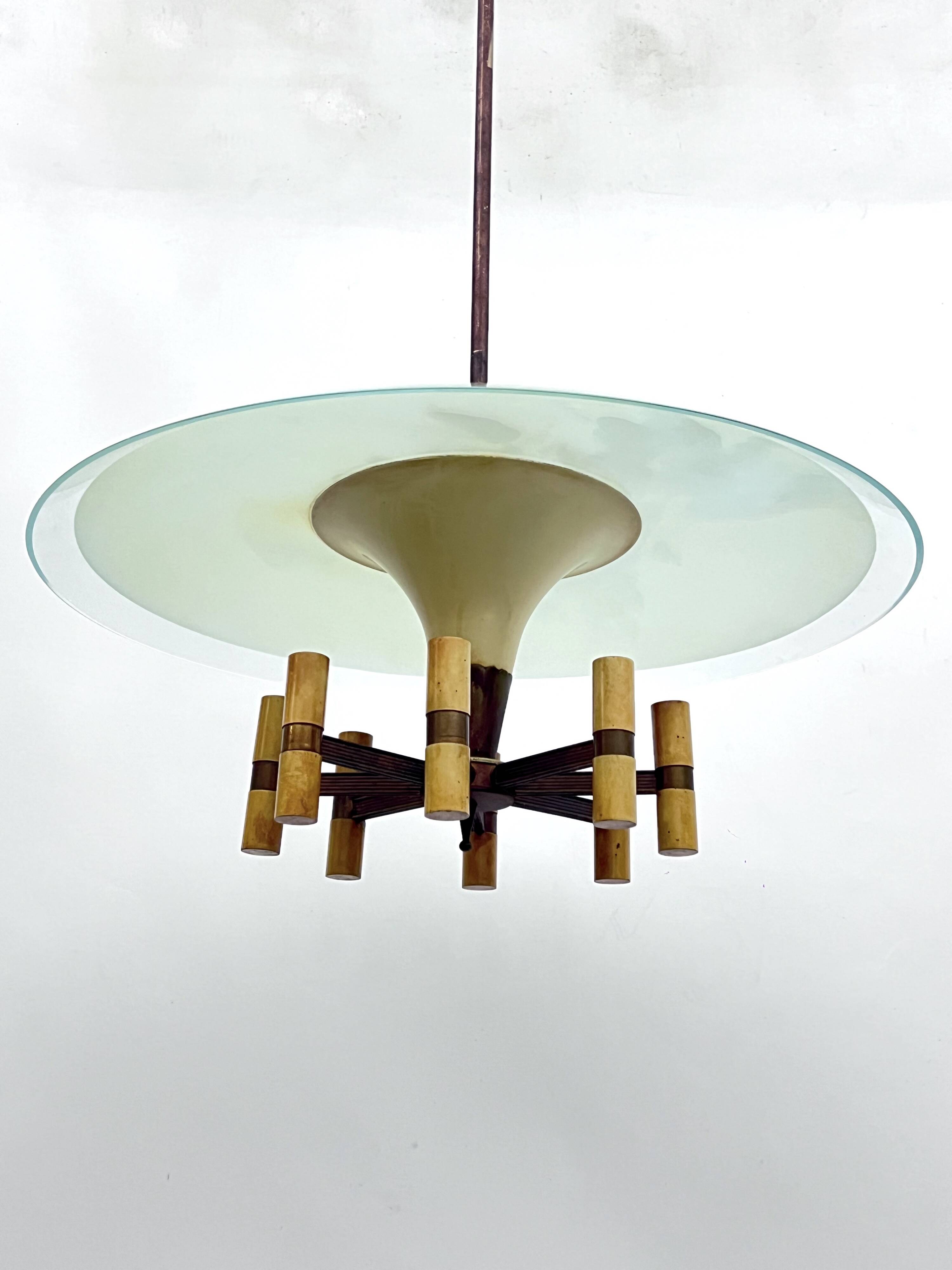 Curved glass disk chandelier. Italy 1950s