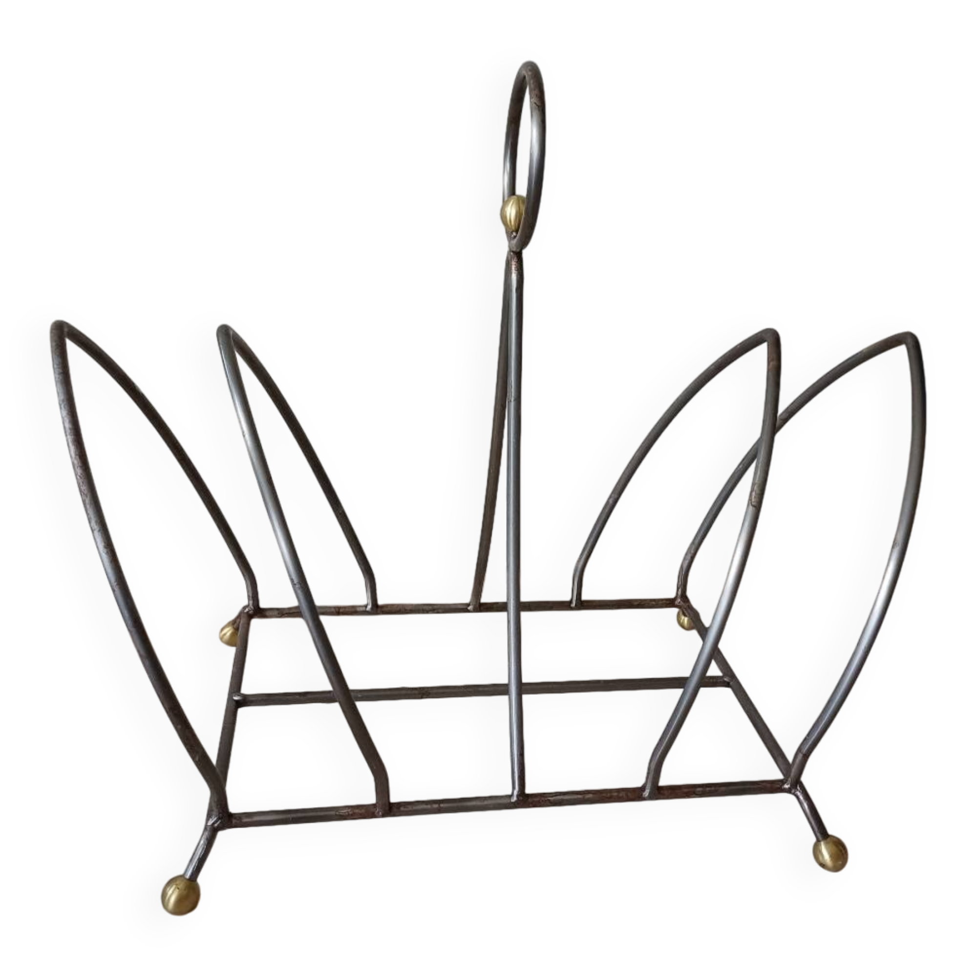 Vintage magazine rack with brass legs