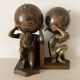 Atlas bookends, globe style with an antique world map.