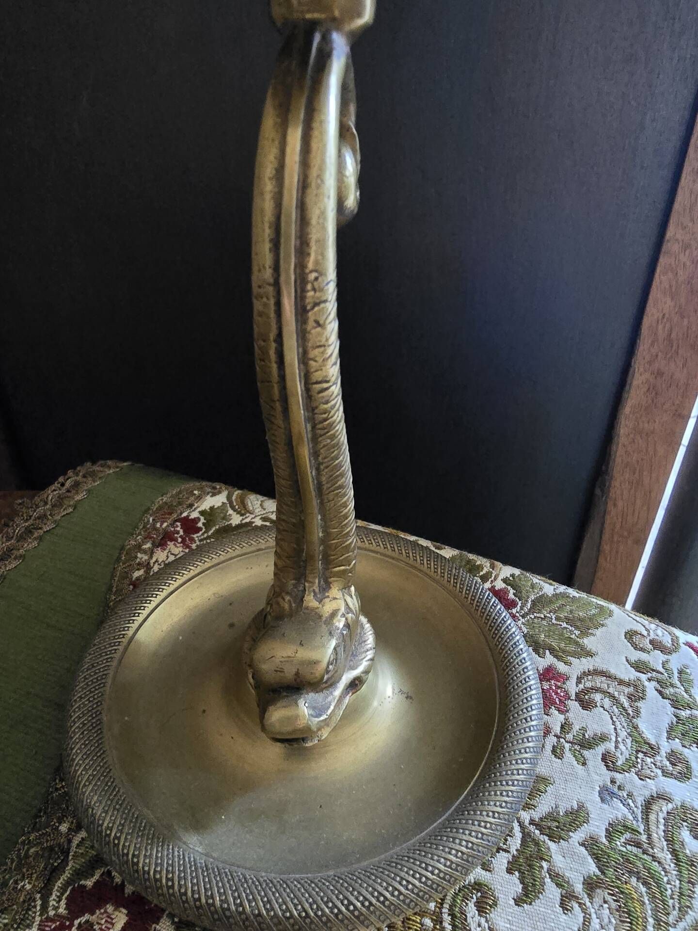 Table lamp with brass fish and draped glass tulip.