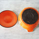 Old cast iron pot enamelled orange Le Creuset