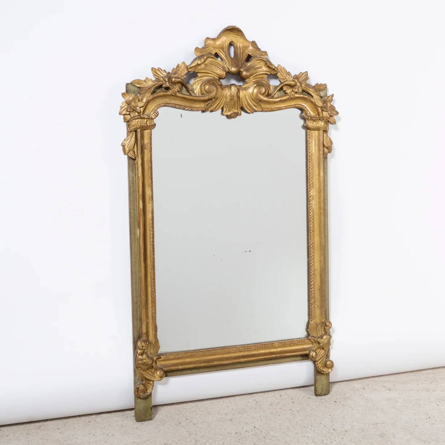 Antique flowered mirror from the 19th century.