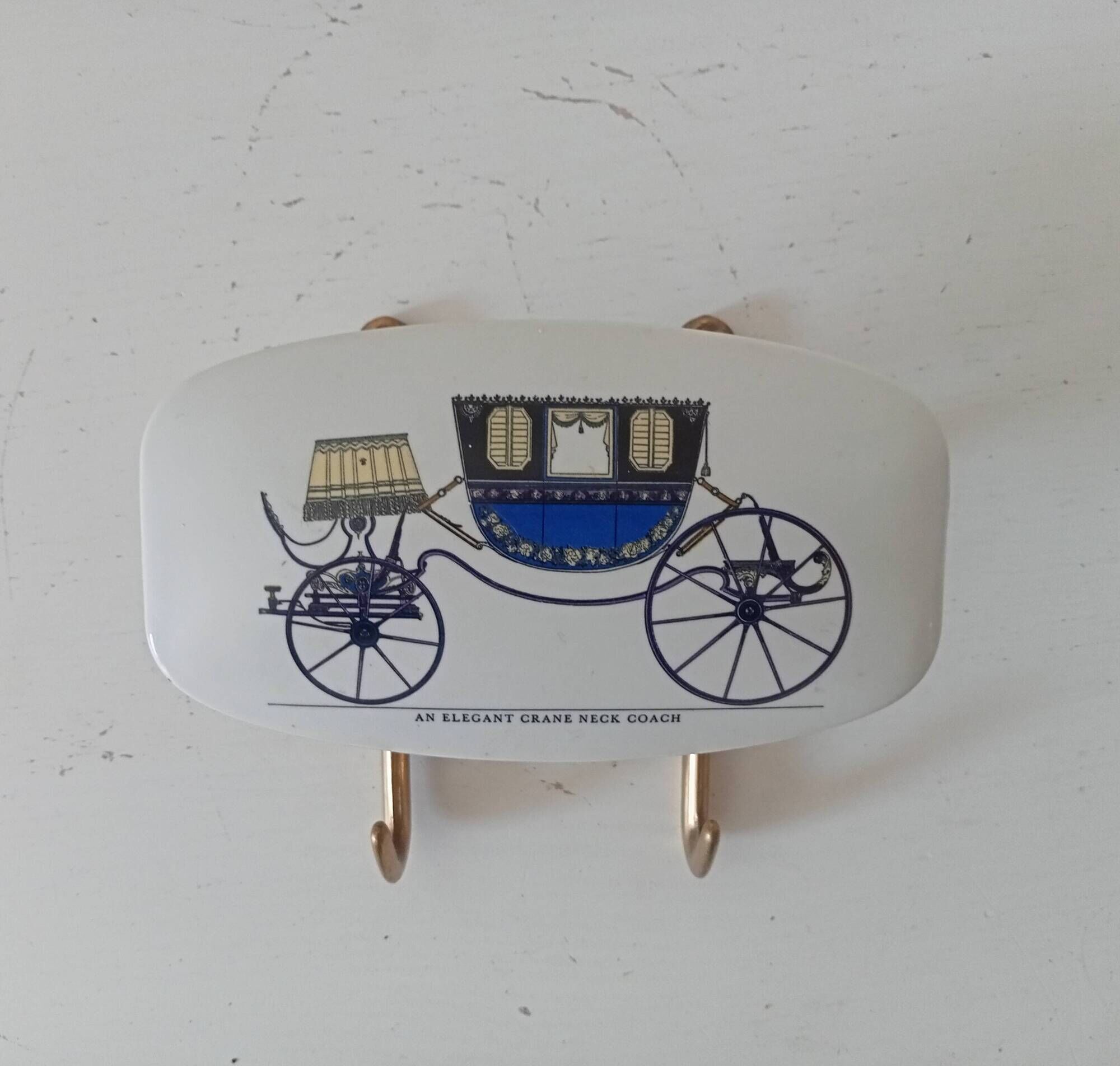 Set of 2 wall coat hooks in Bakelite and brass from the 1950s/60s.
