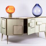 Geometric sideboard in glass and gilded brass. Contemporary Italian work.