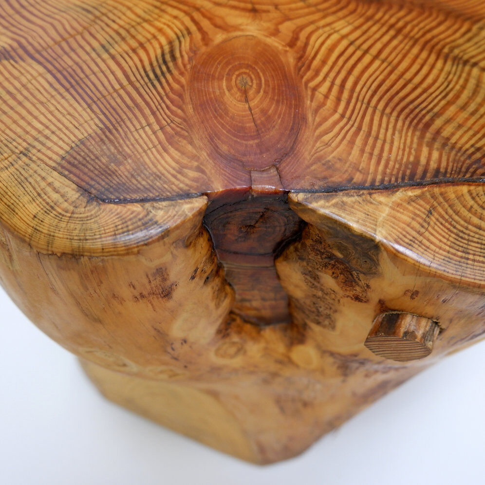 Brutalist sculptural chair in solid oak in wabi-sabi style.