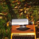 Silver reed orange and black typewriter with bag
