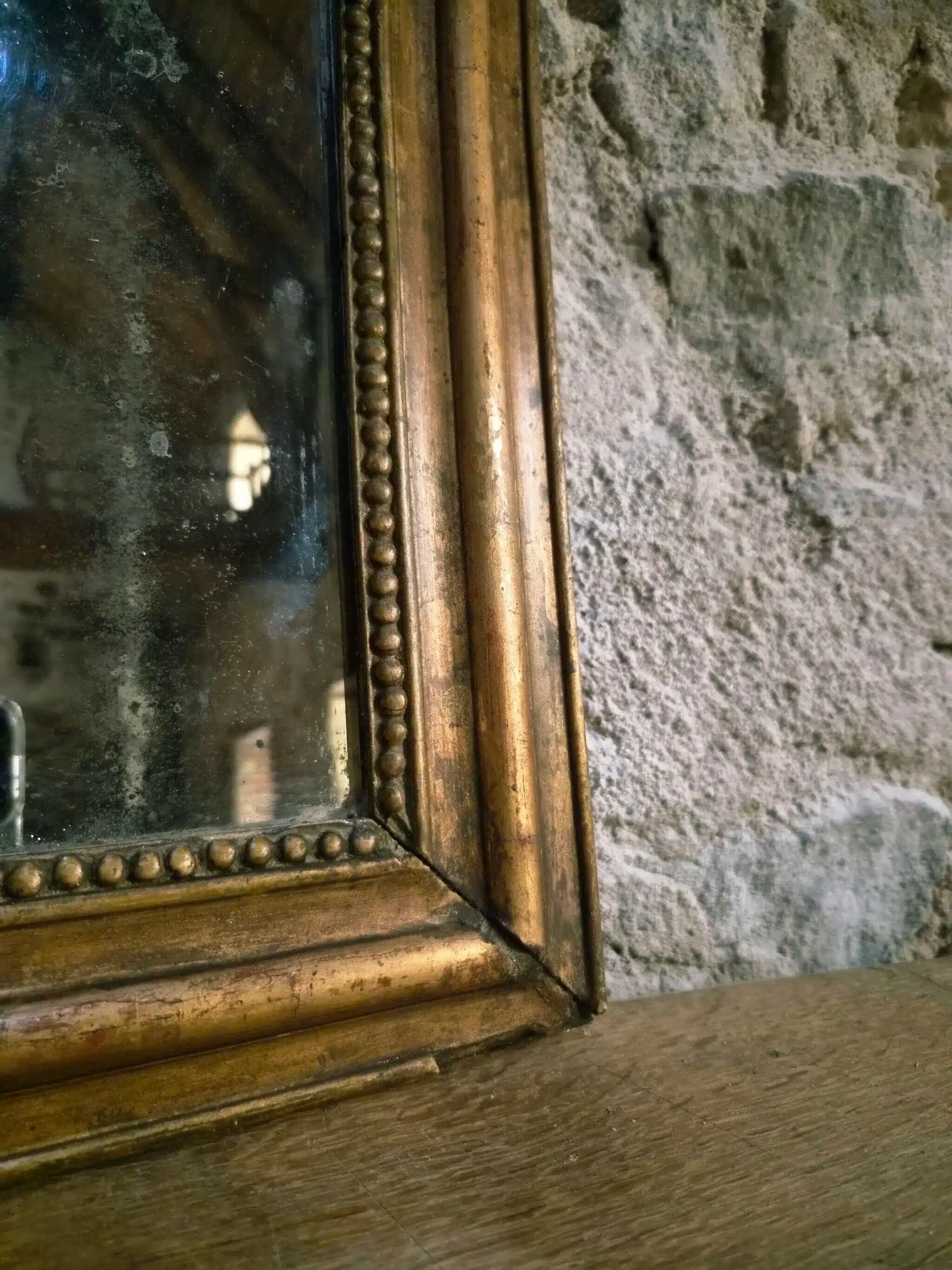 Antique French Louis Philippe mirror, gilded mercury mirror, 19th century.