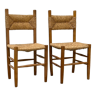 Pair of wooden chairs with seat and straw back