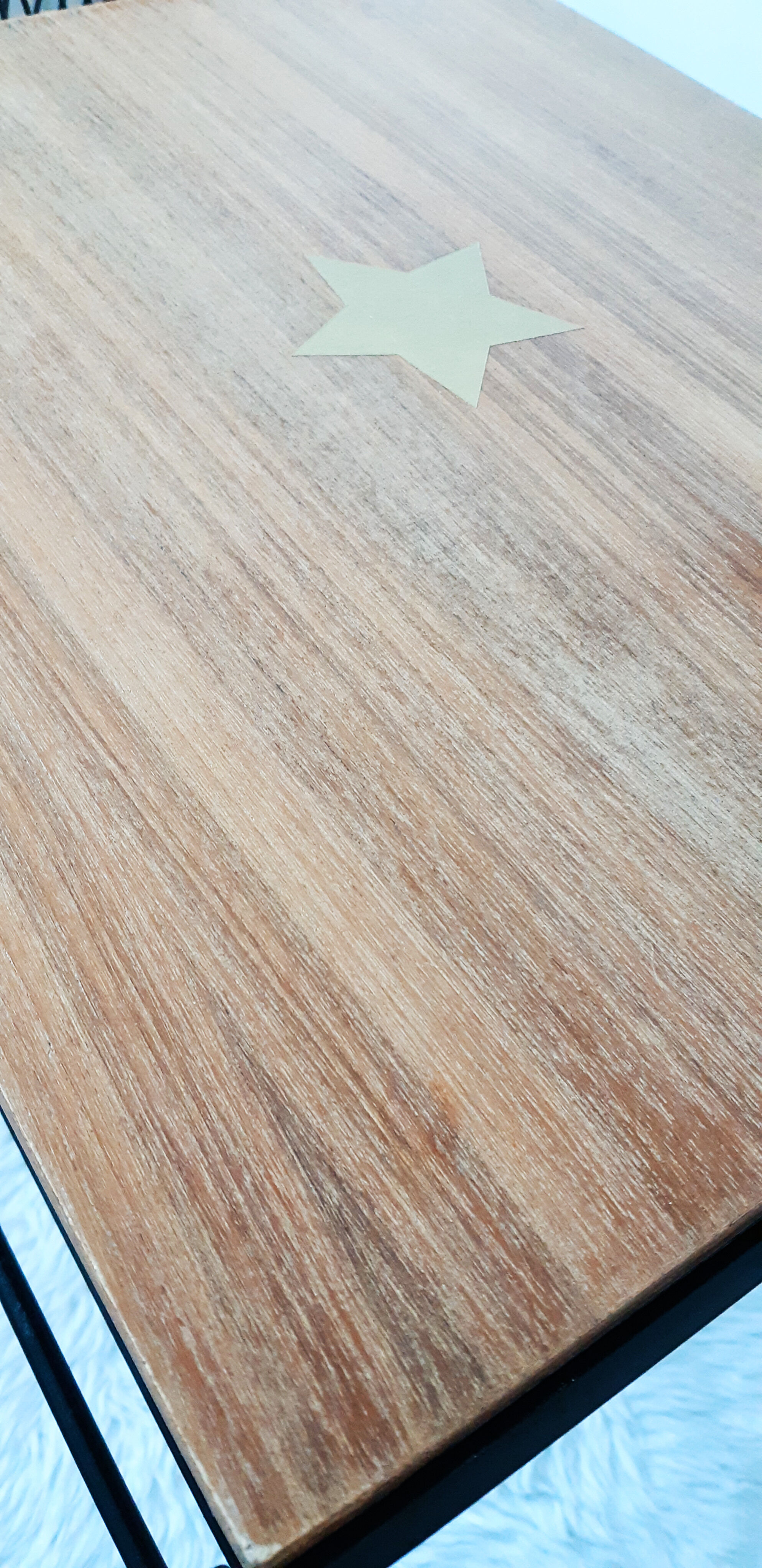 Table has record player, wearing vintage discs