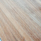 Table has record player, wearing vintage discs