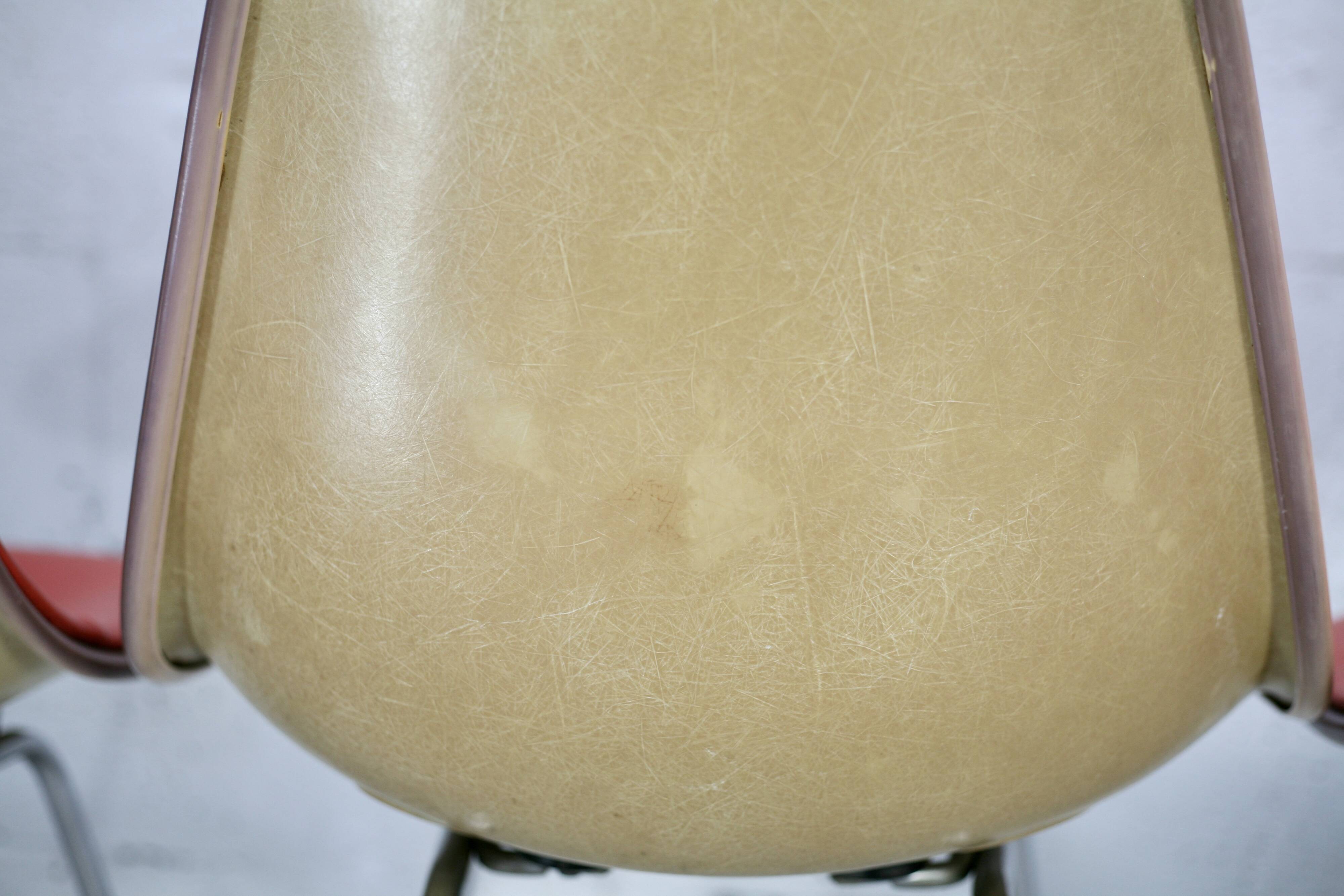 Ray & Charles Eames, Herman Miller edition, set of 4 orange chairs. Circa 1960