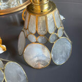 Pair of portable lamps with mother-of-pearl lampshades and brass.