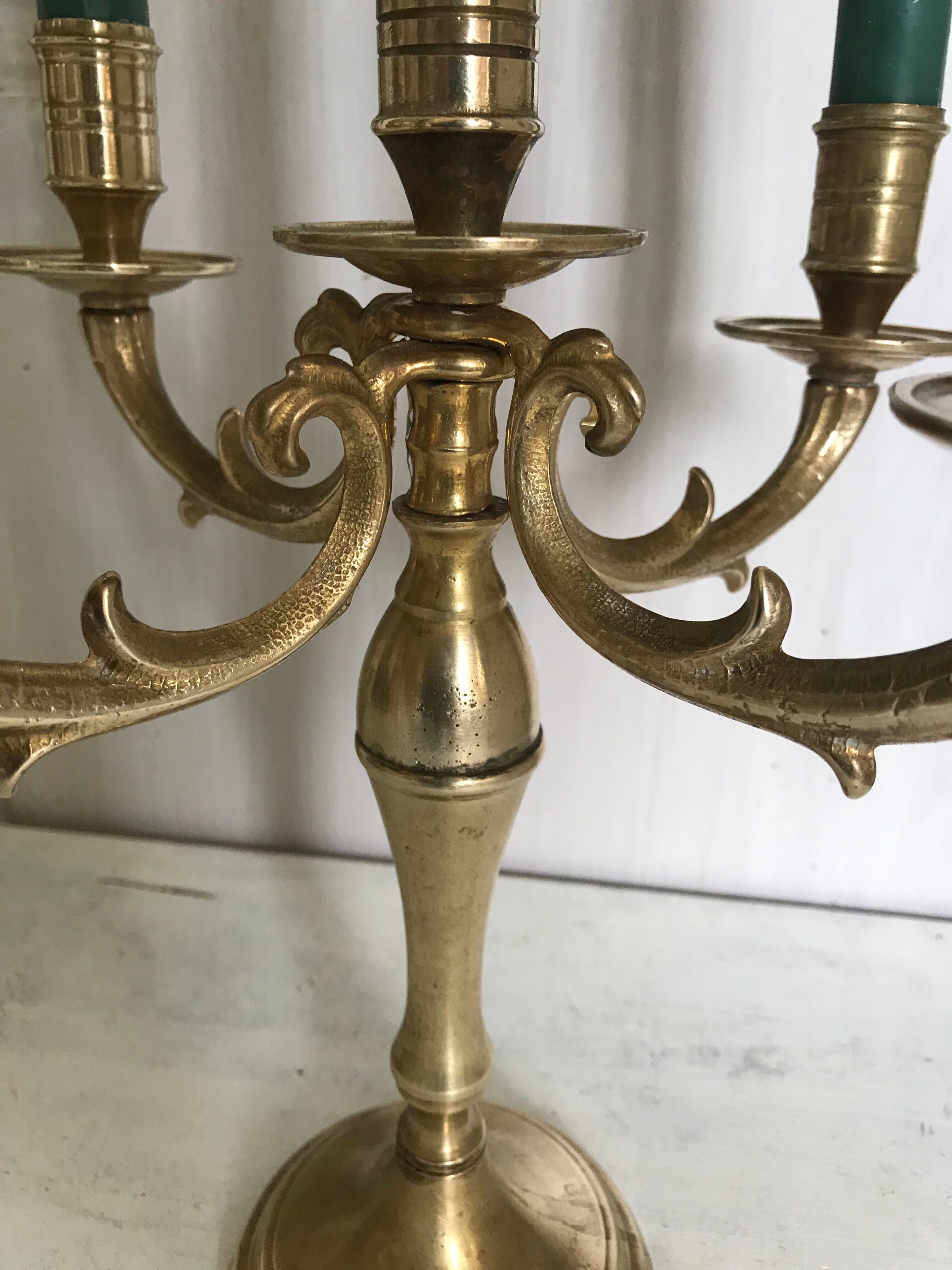Ancient gilded bronze candlestick