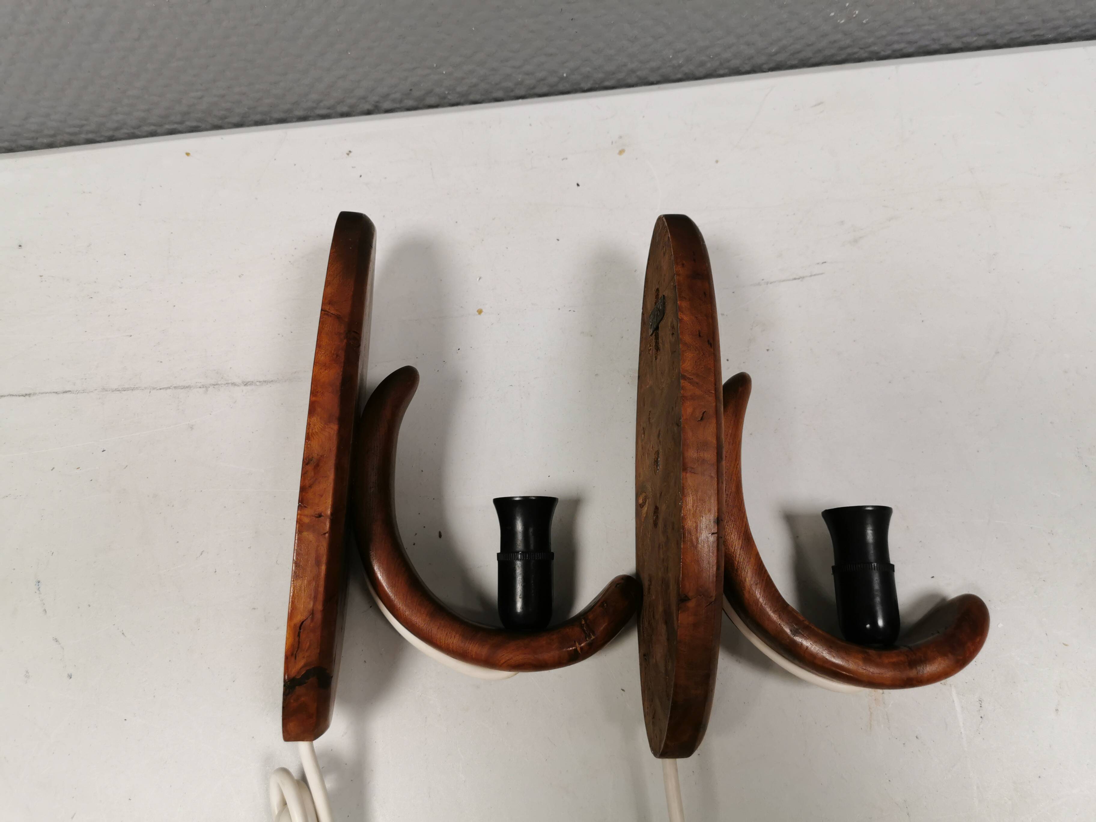 A set of old wall lamps in walnut.