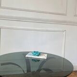 Round smoked glass coffee table from the 70s