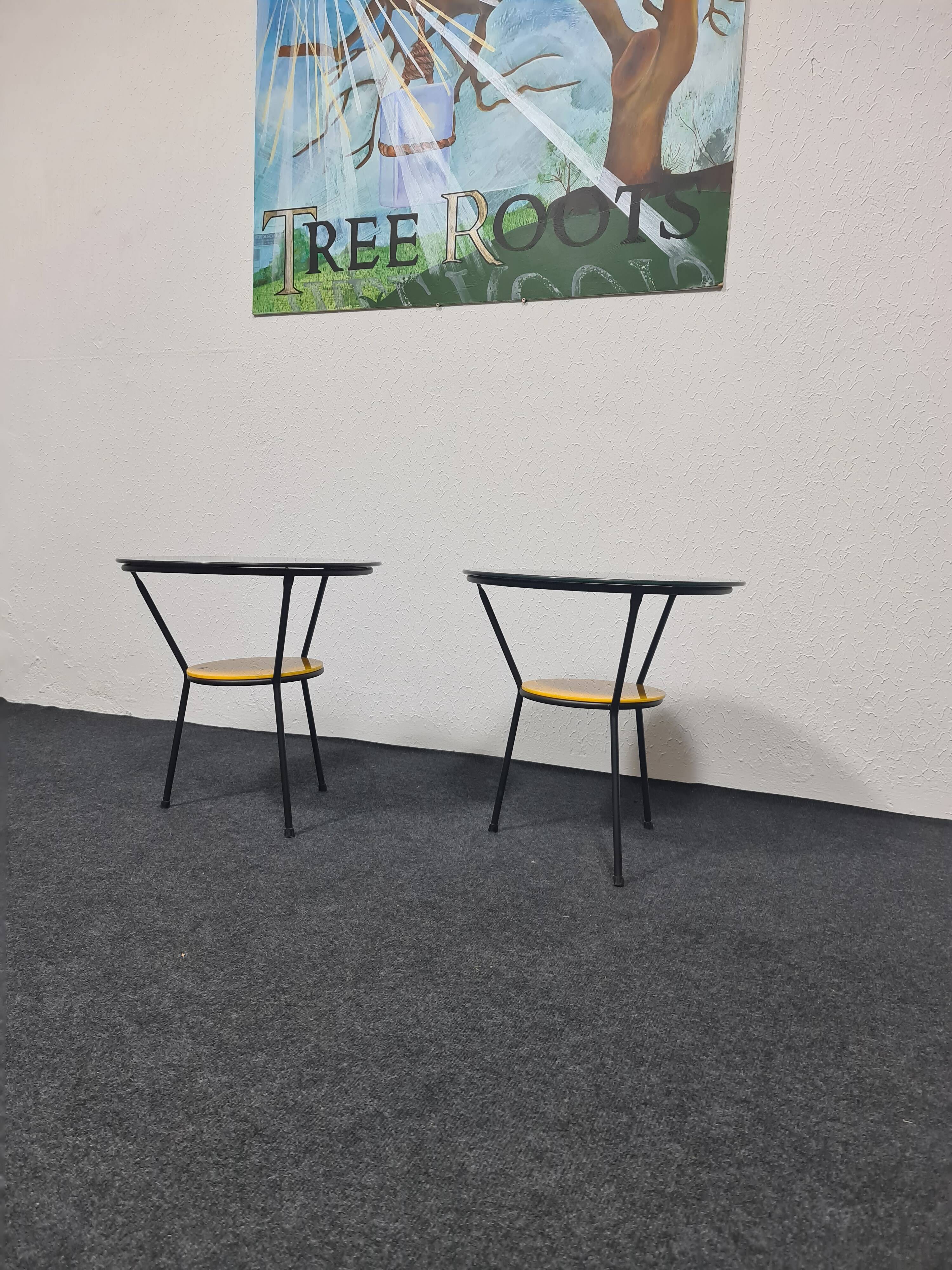 Pair of vintage glass topped side tables