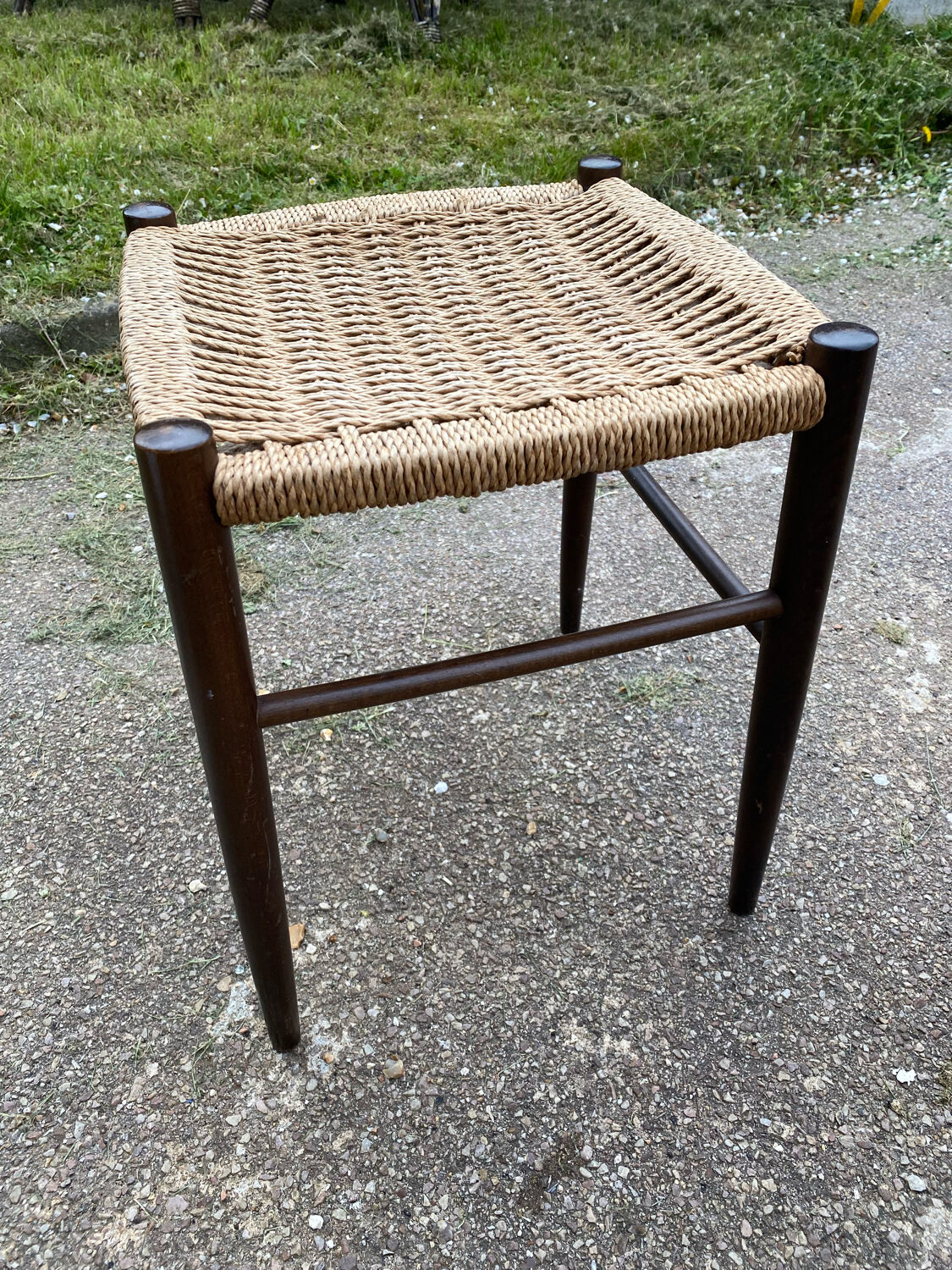 Vintage wooden stool and rope