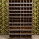 Antique workshop furniture in solid fir with numerous compartments.