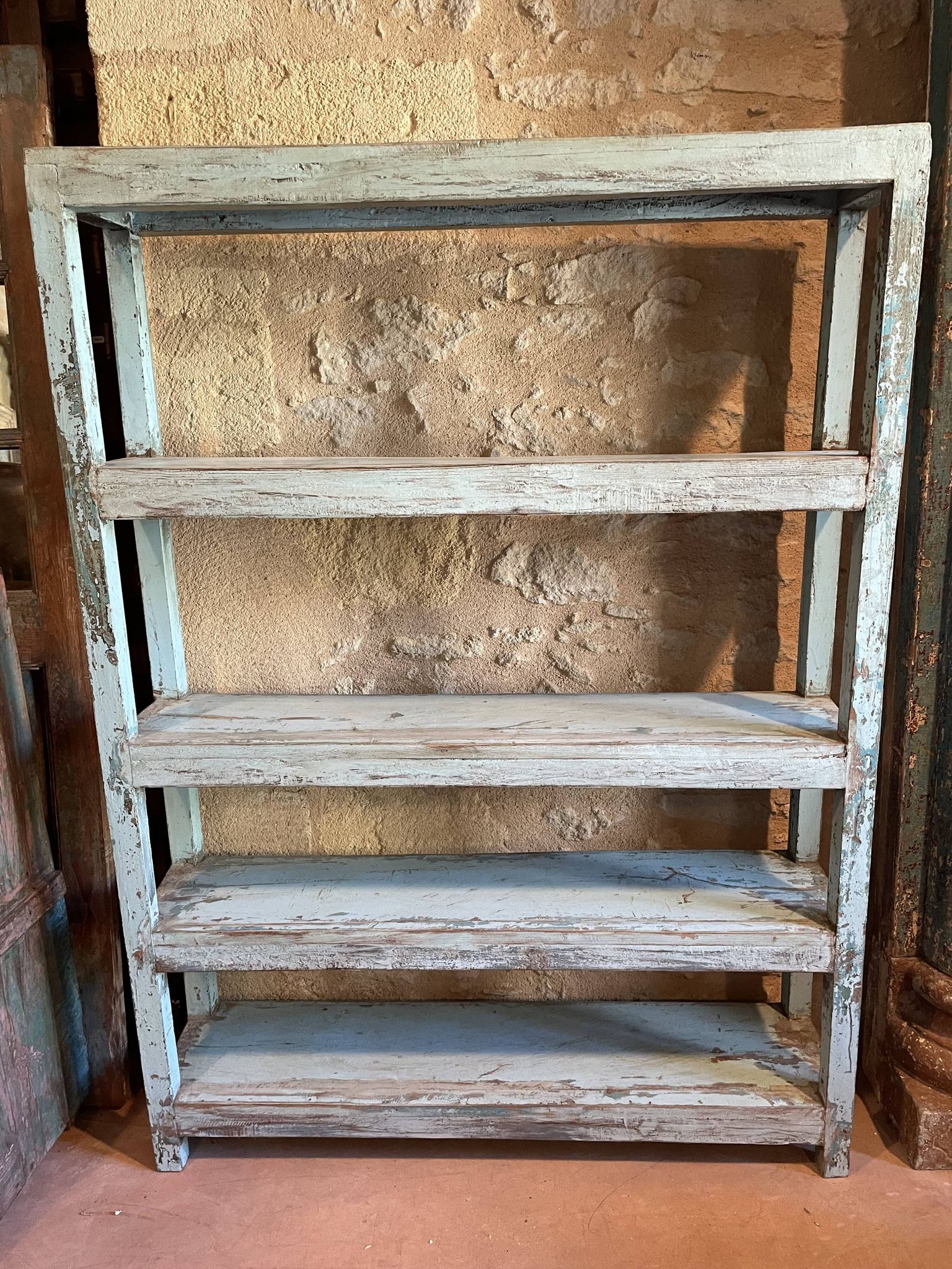 Blue lacquered teak shelves