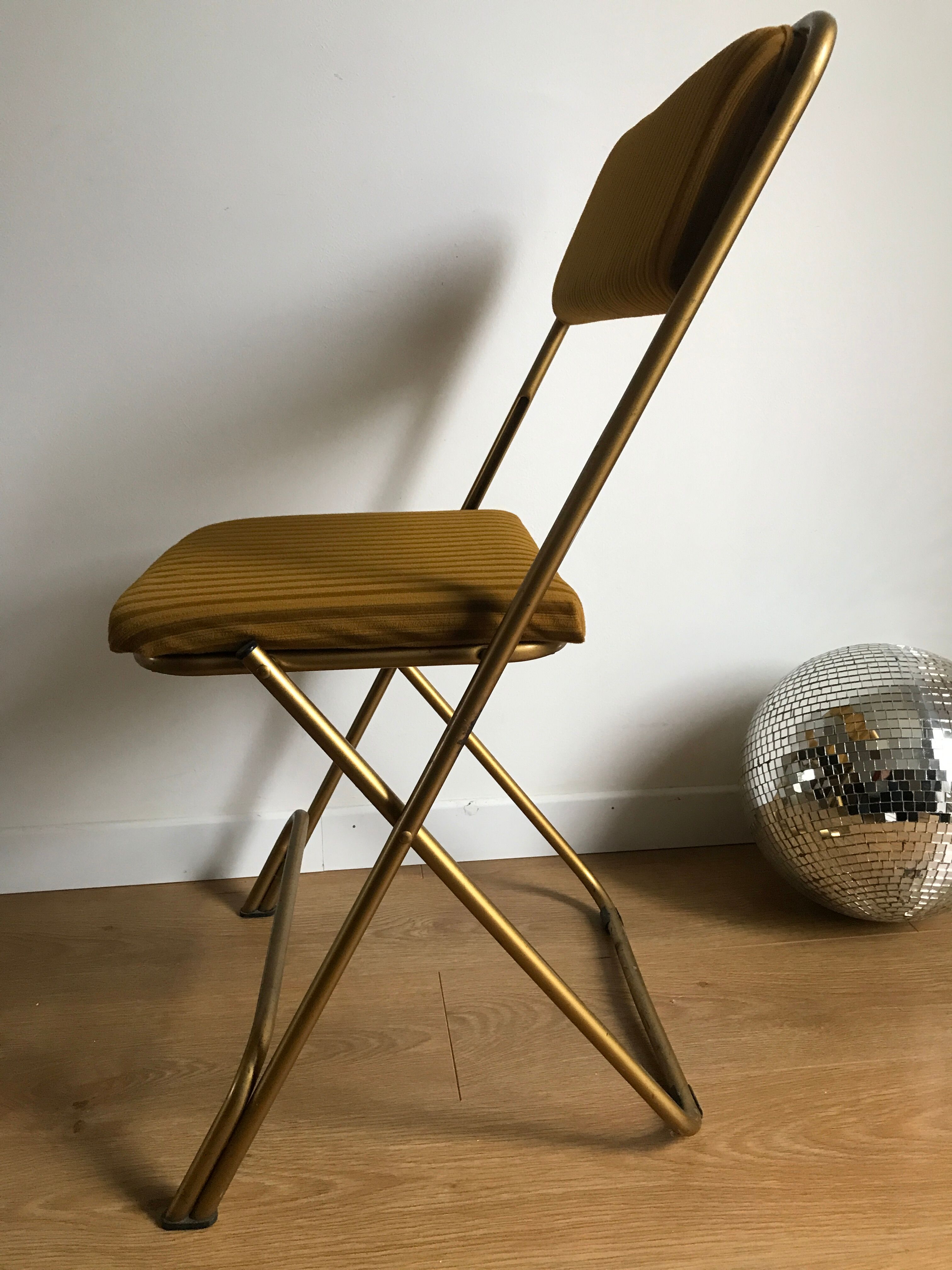 Vintage folding chair lafuma chantazur with striped gold fabric
