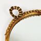 Round wall mirror in gilded wood, mid-century, C. Allodi & G. Subelli, Italy, 1950s.