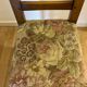 Antique chair with upholstered fabric seat