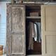 The antique patinated wardrobe