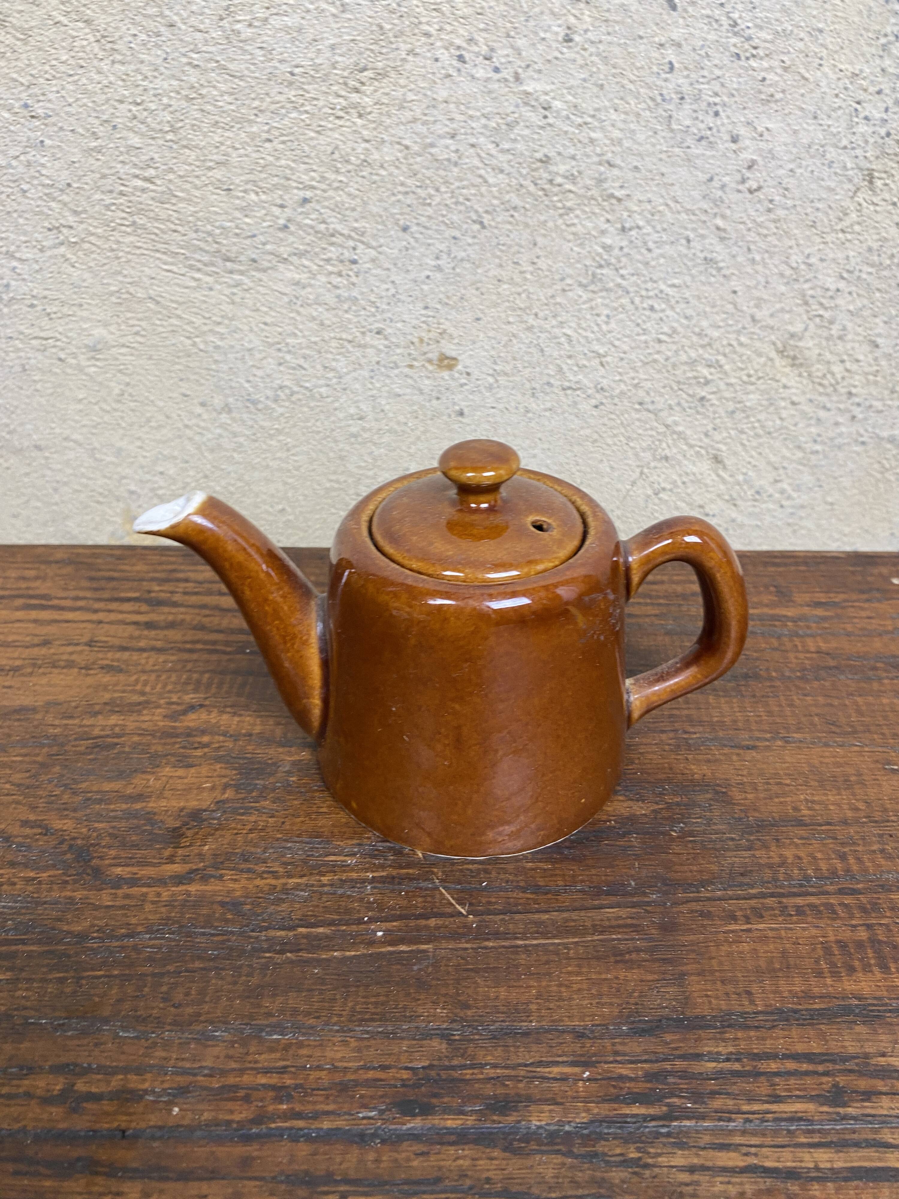 Small vintage brown teapot