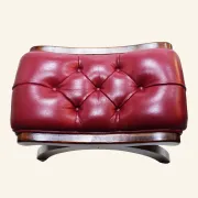 Vintage tufted footrest in red faux leather and solid beech.