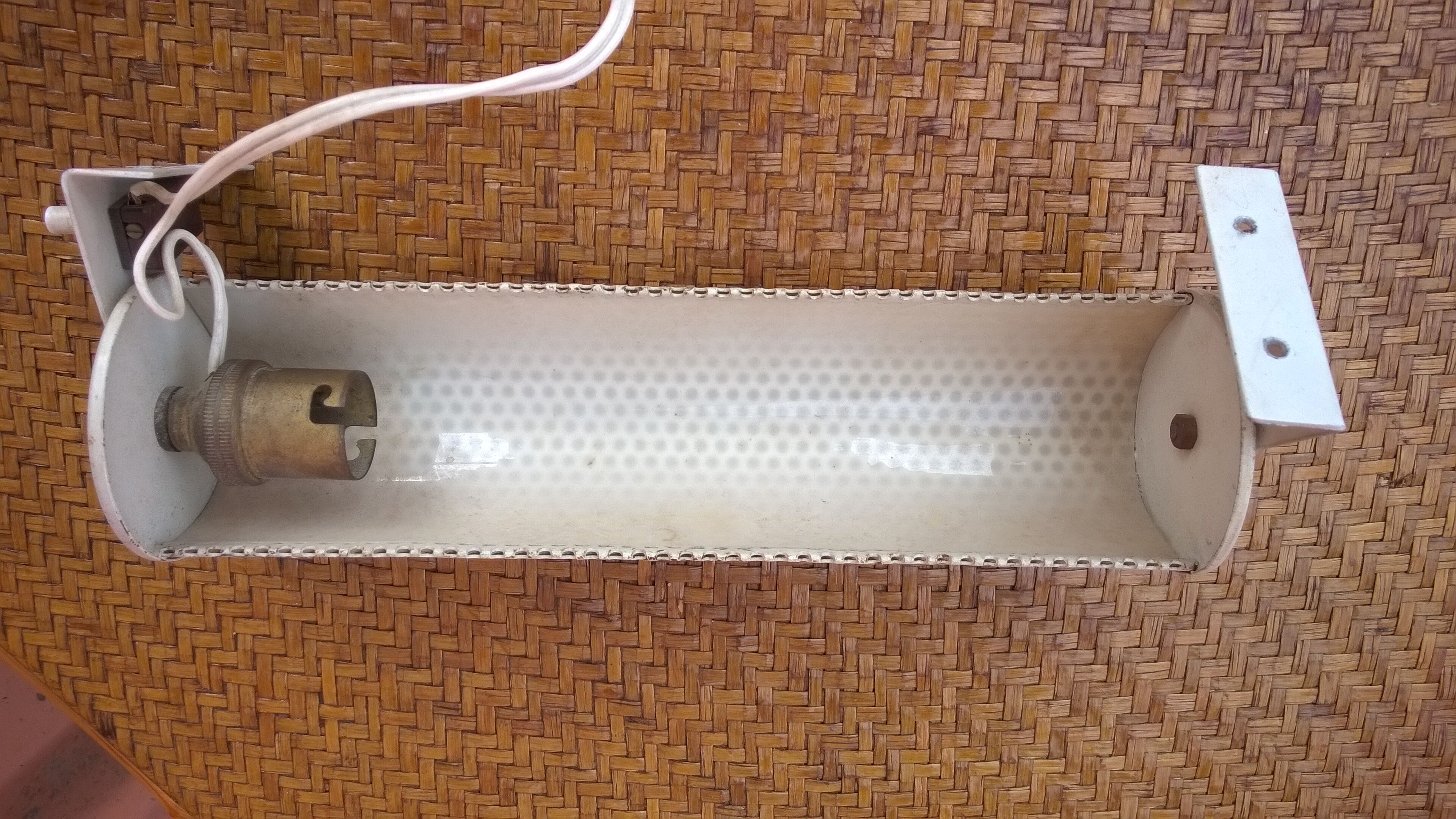 Perforated tole sconce