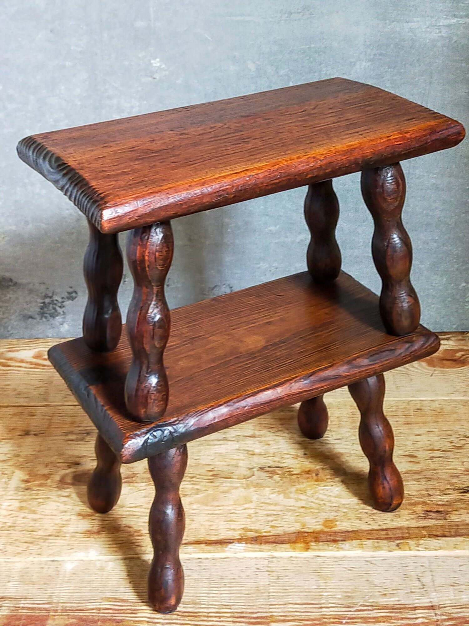 Pair of vintage solid turned wood footstools