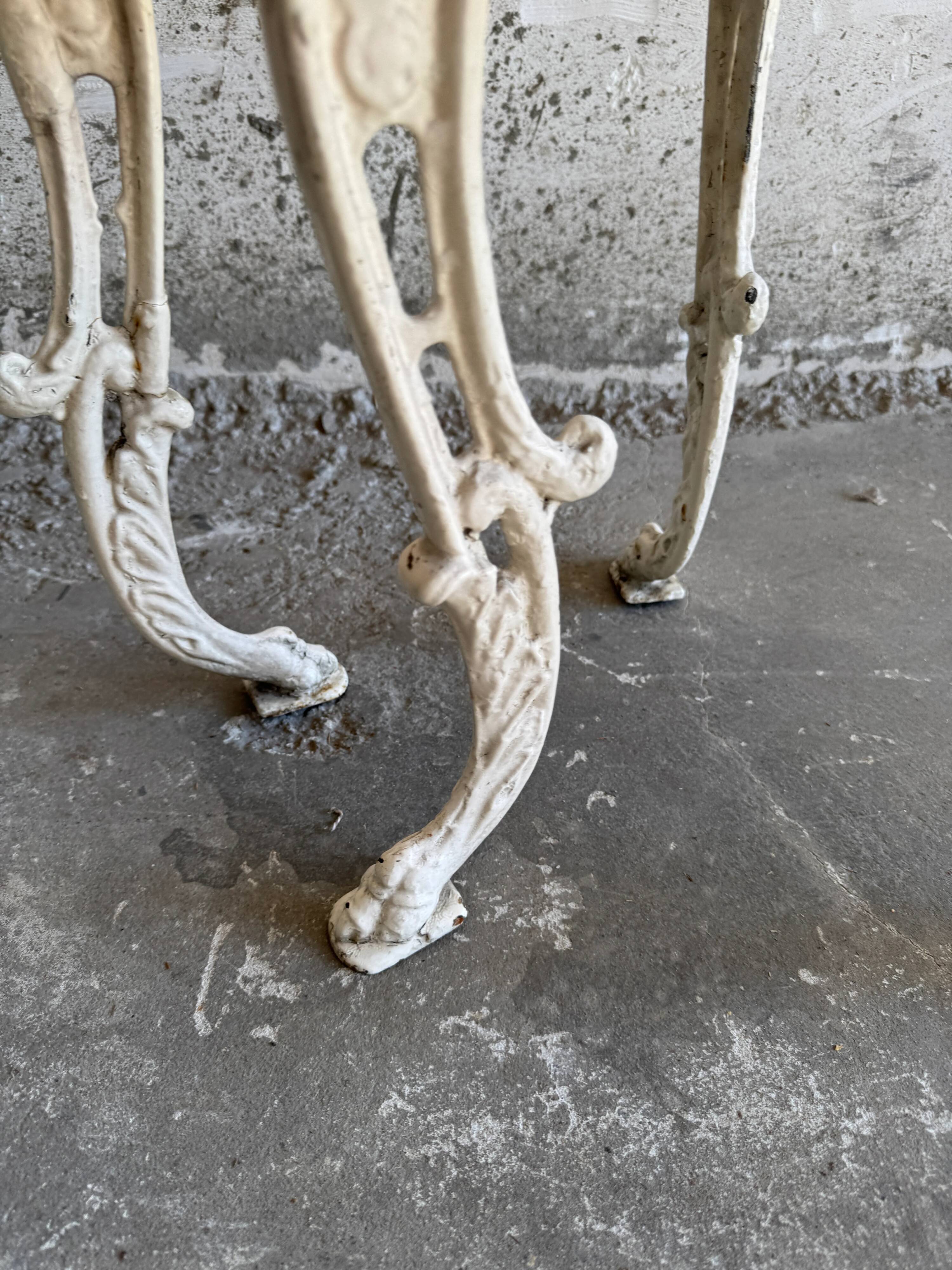 Pair of cream-white cast iron side tables with wooden tops — neoclassical shabby-chic