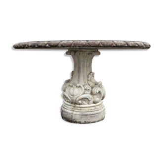 Jolie table ronde en pierre reconstituée