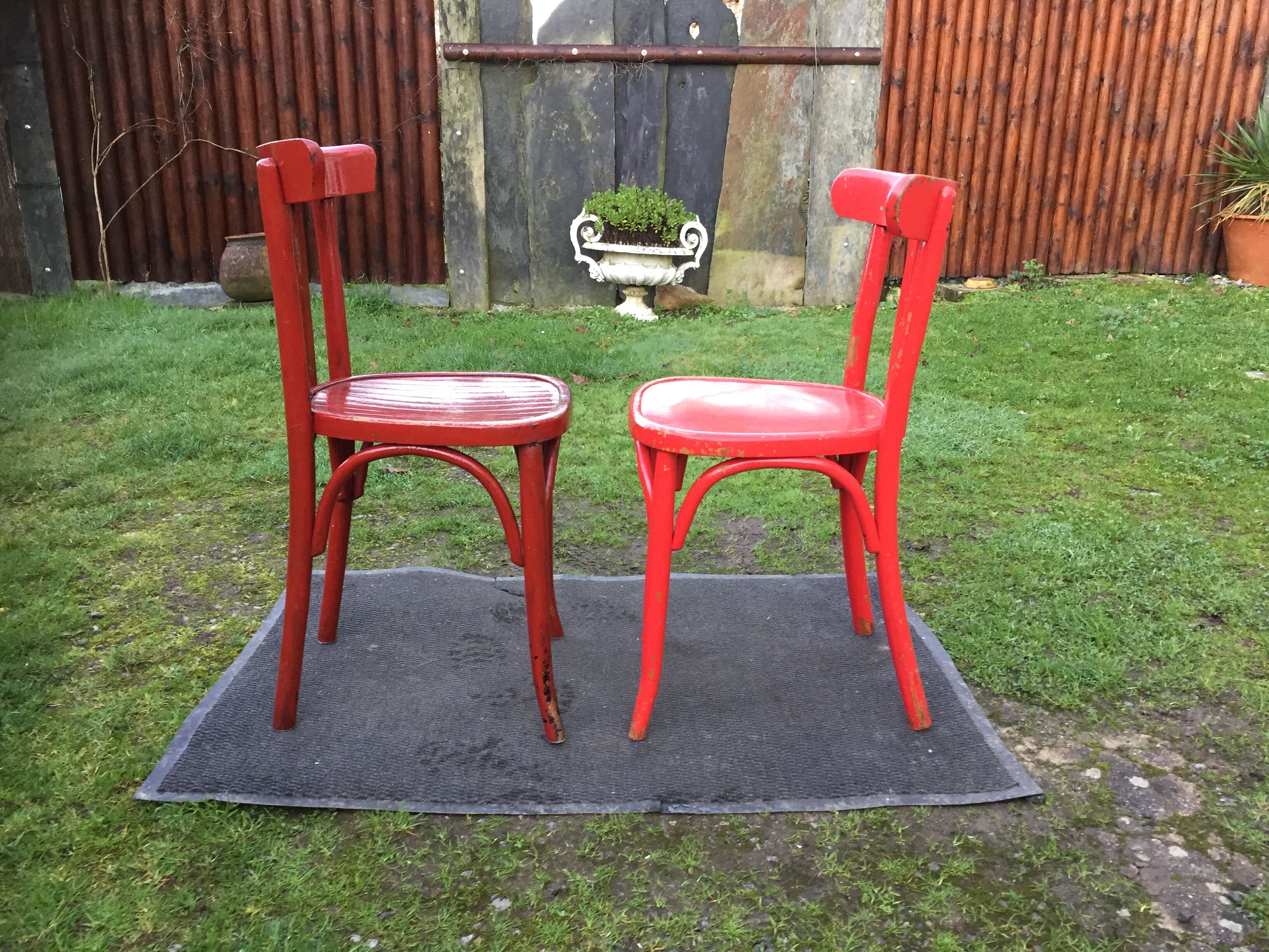 Vintage bistro chairs painted in burgundy and red