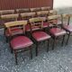 Lot de 12 chaises bistrot TON en bois et skaï rouge vintage.