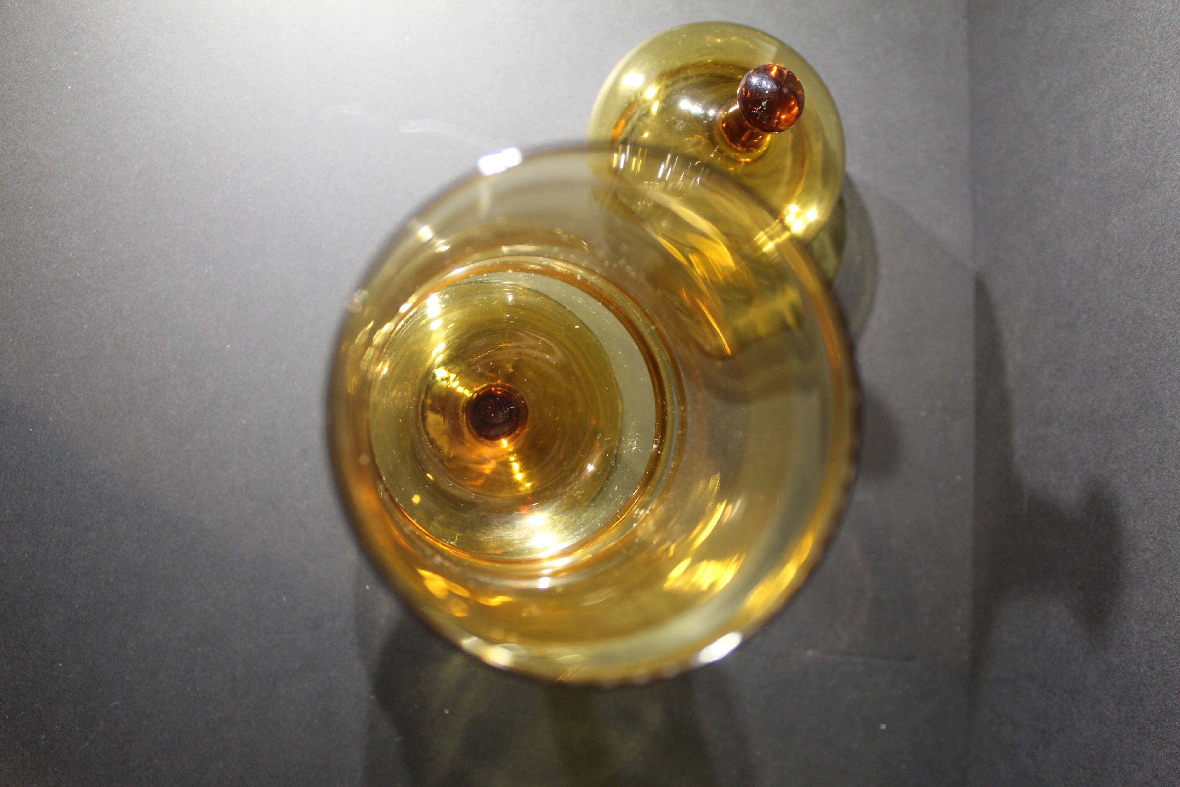 Yellow glass candy on foot