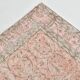 Tapis vintage à décor floral rouge et beige