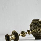 Carved brass candlestick holder