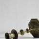 Carved brass candlestick holder