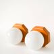 Pair of globe wall lights in opaline with a pine base, 1980.