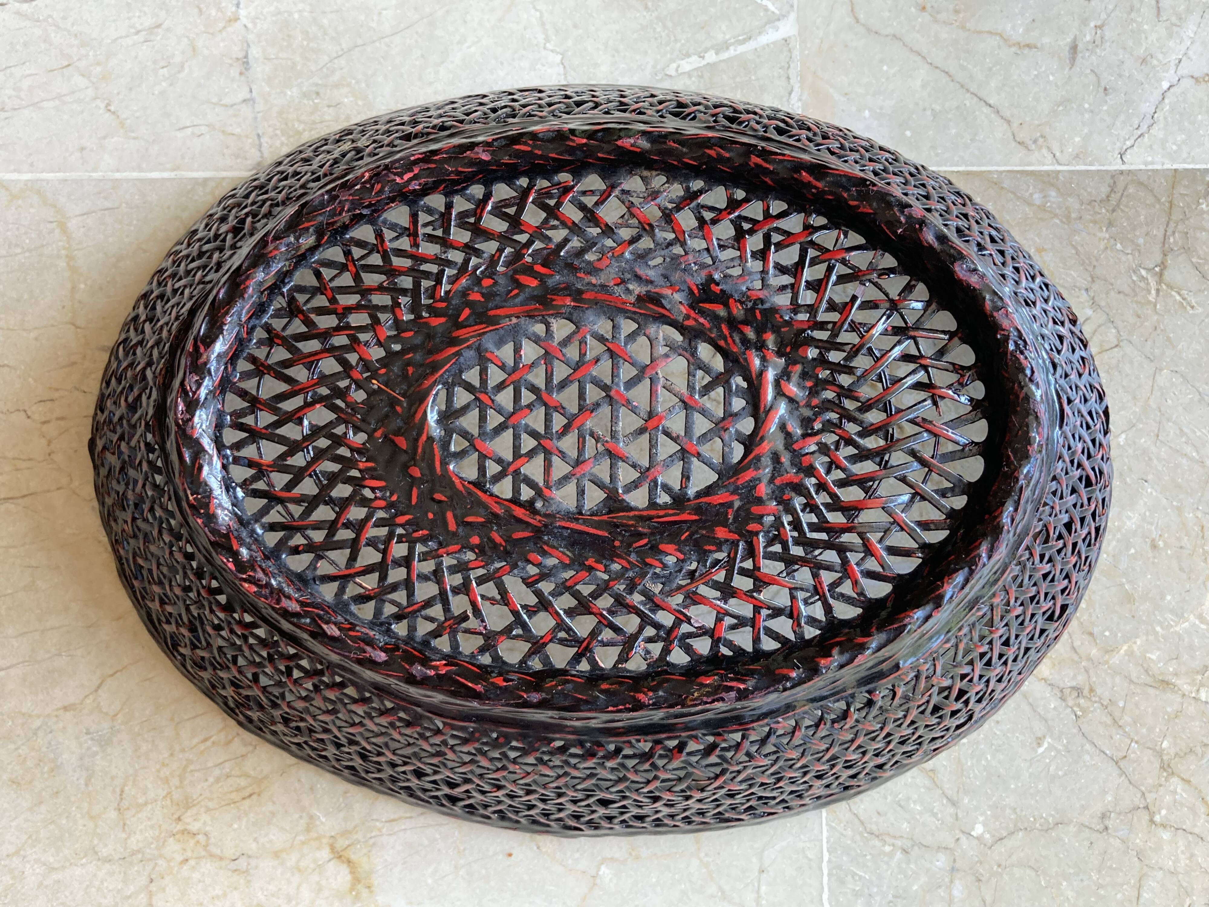 Japanese oval basket in negoro lacquered basketry (red lacquer on black background)