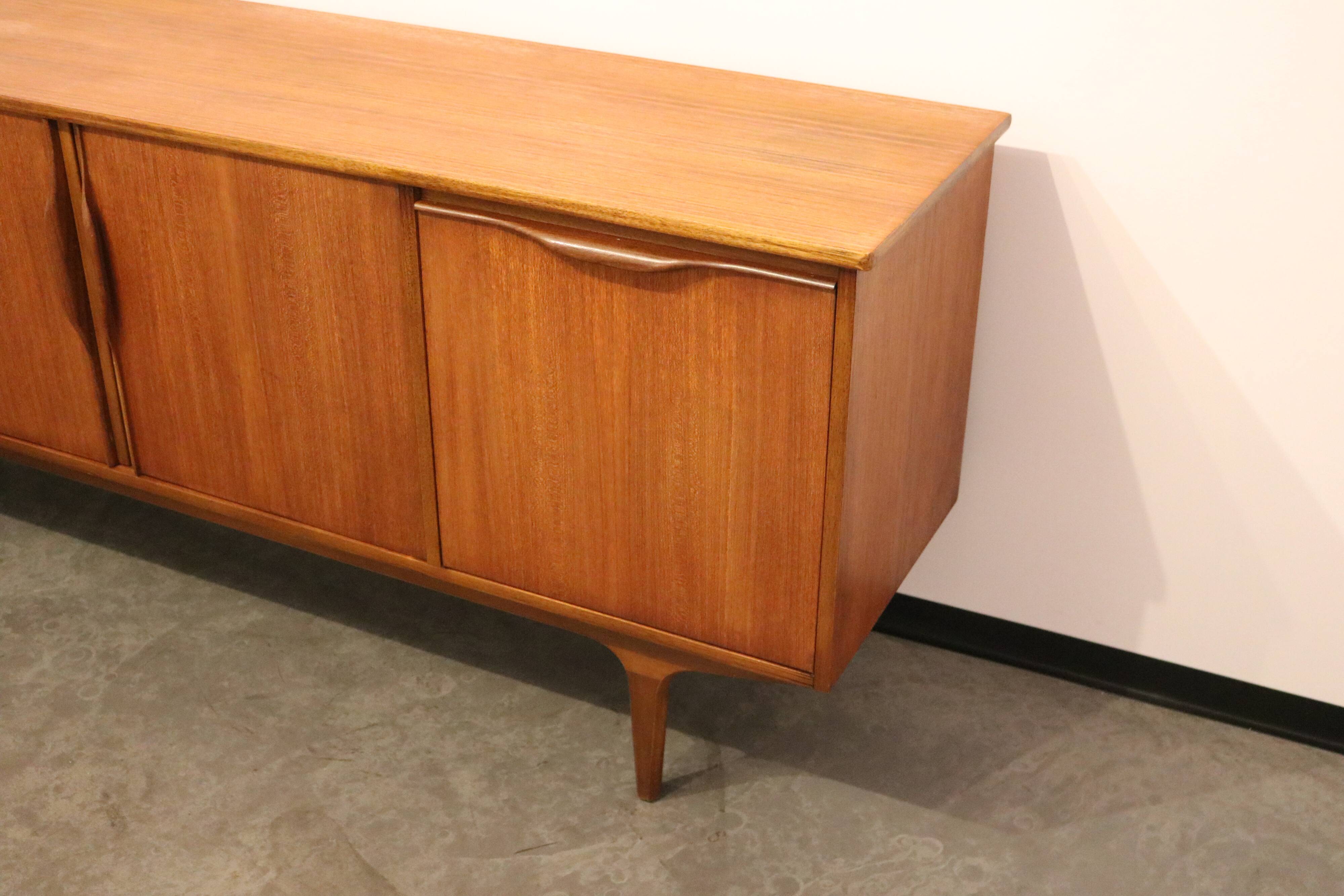 Sideboard in teak with built-in bar, Mcintosch - Scotland - 1960's