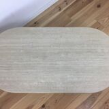 Oval coffee table in travertine