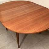 Scandinavian round teak dining table from the 60s extendable