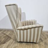 Winged armchair with footstool, 1960s.