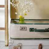 Old cream and green coloured suitcase
